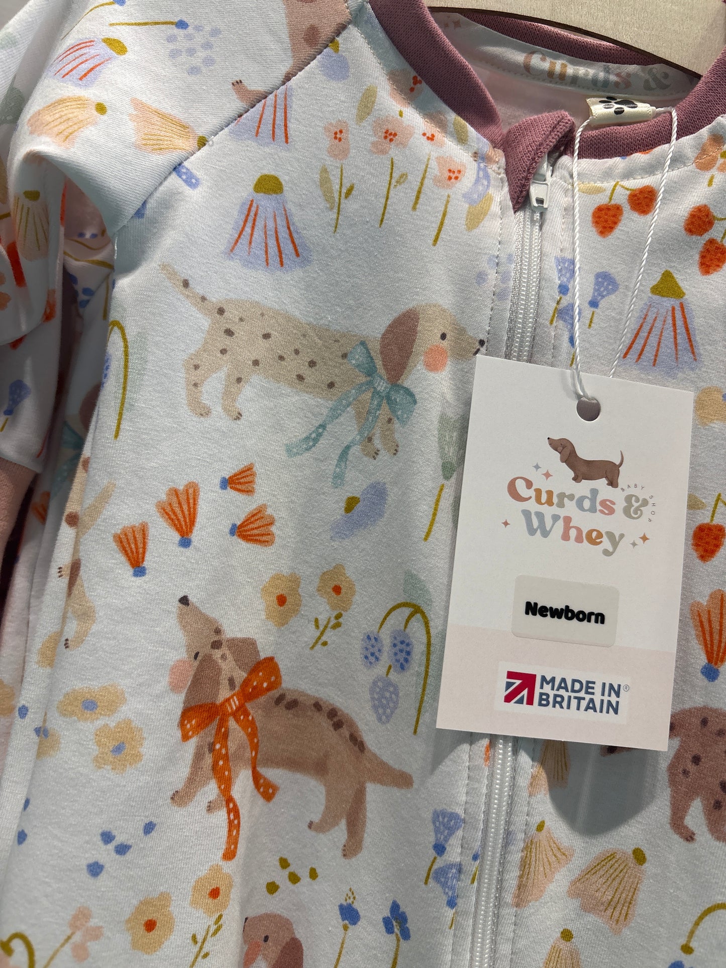 white Meadow zippy baby grow