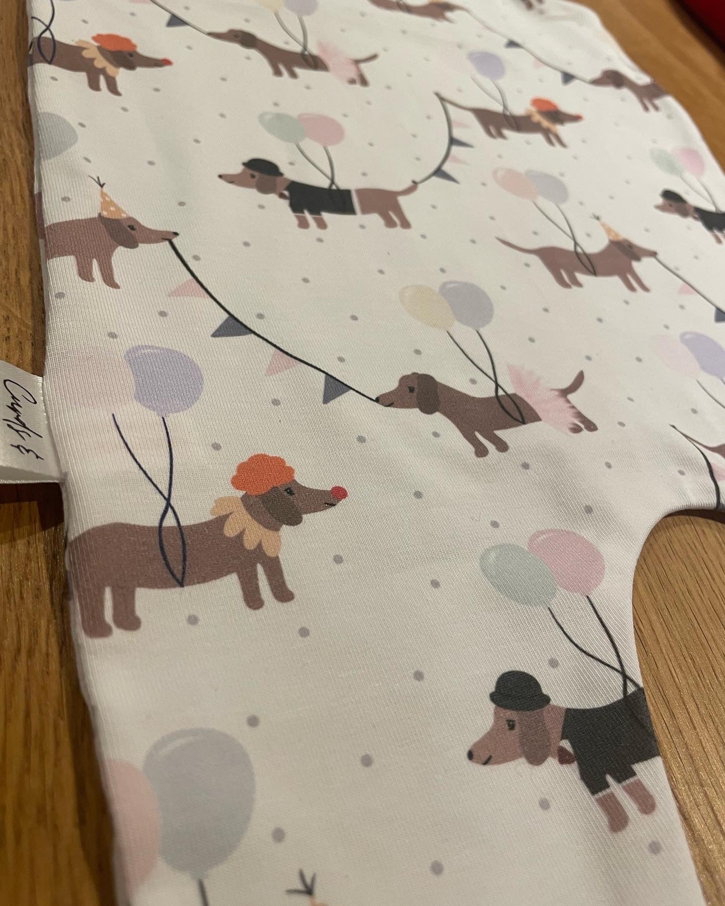 sausage dog celebrations Romper