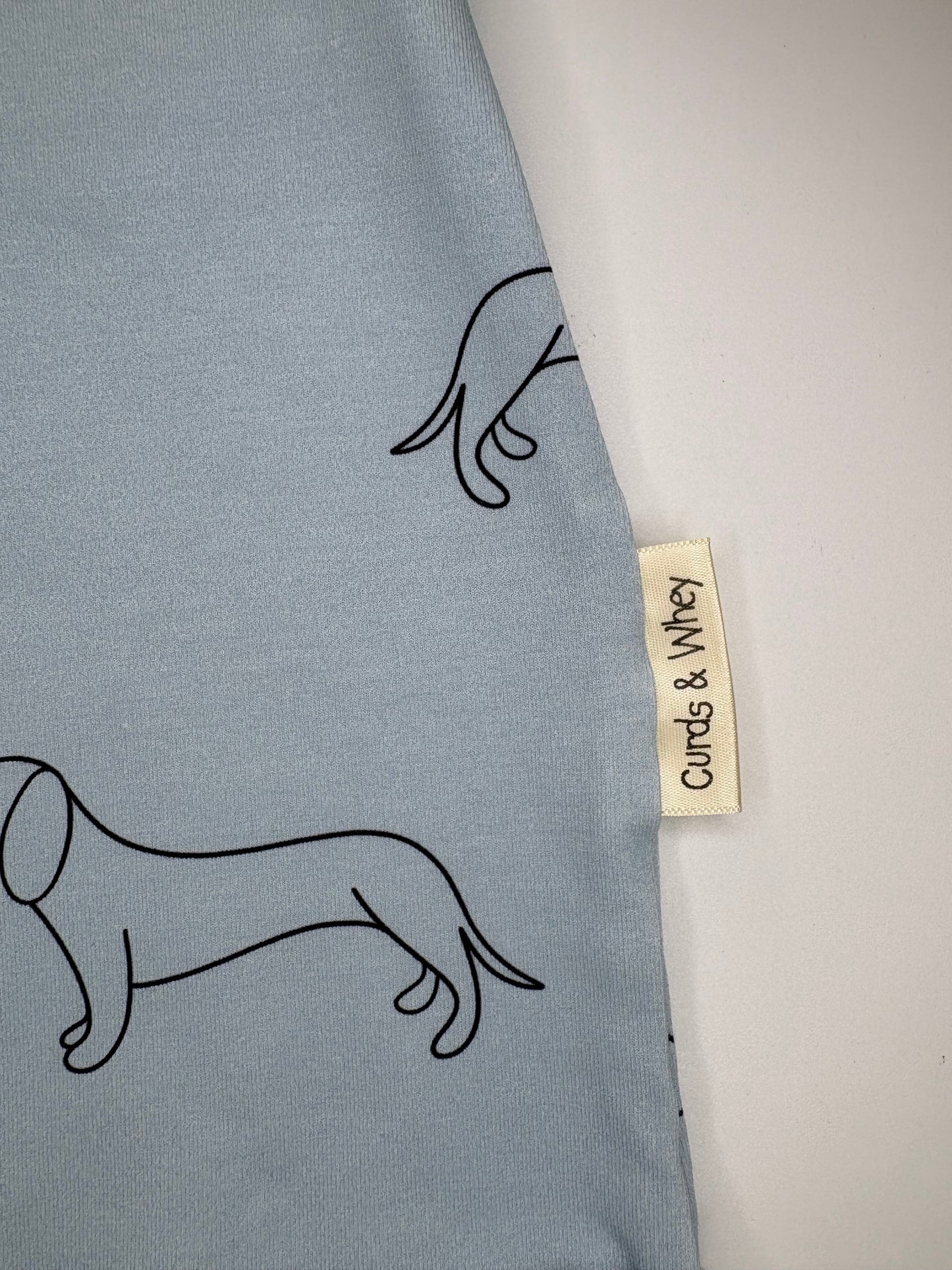 powder blue shortie sausage dog romper