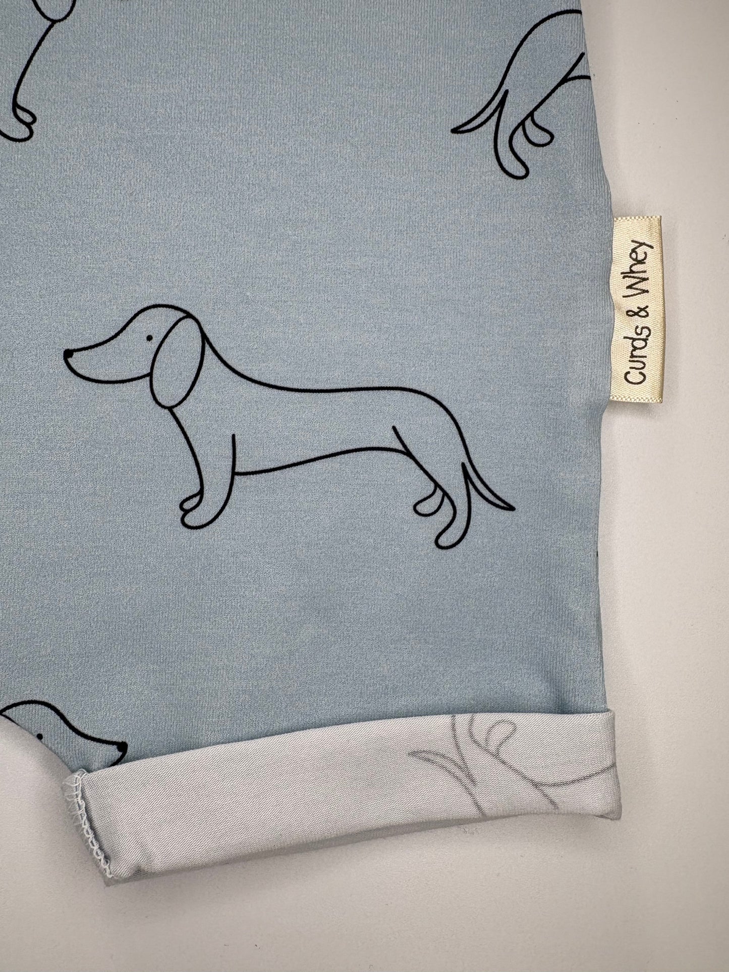 powder blue shortie sausage dog romper