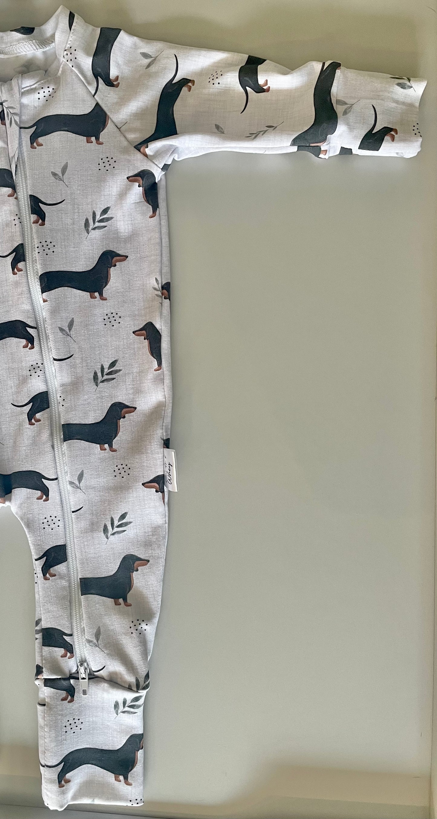 Frankie sausage dog zippy baby-grow