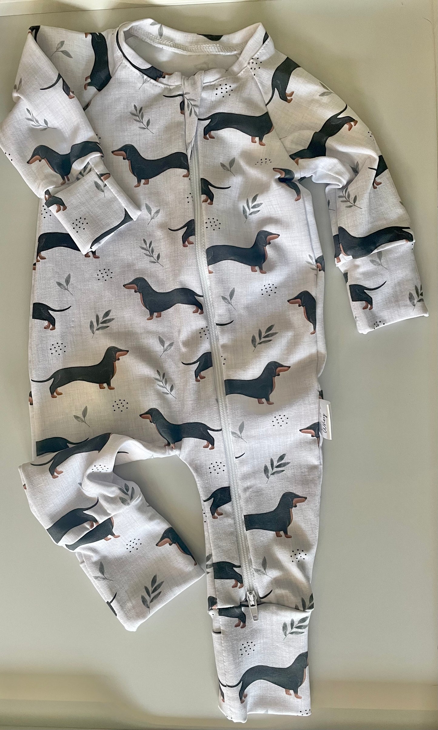 Frankie sausage dog zippy baby-grow