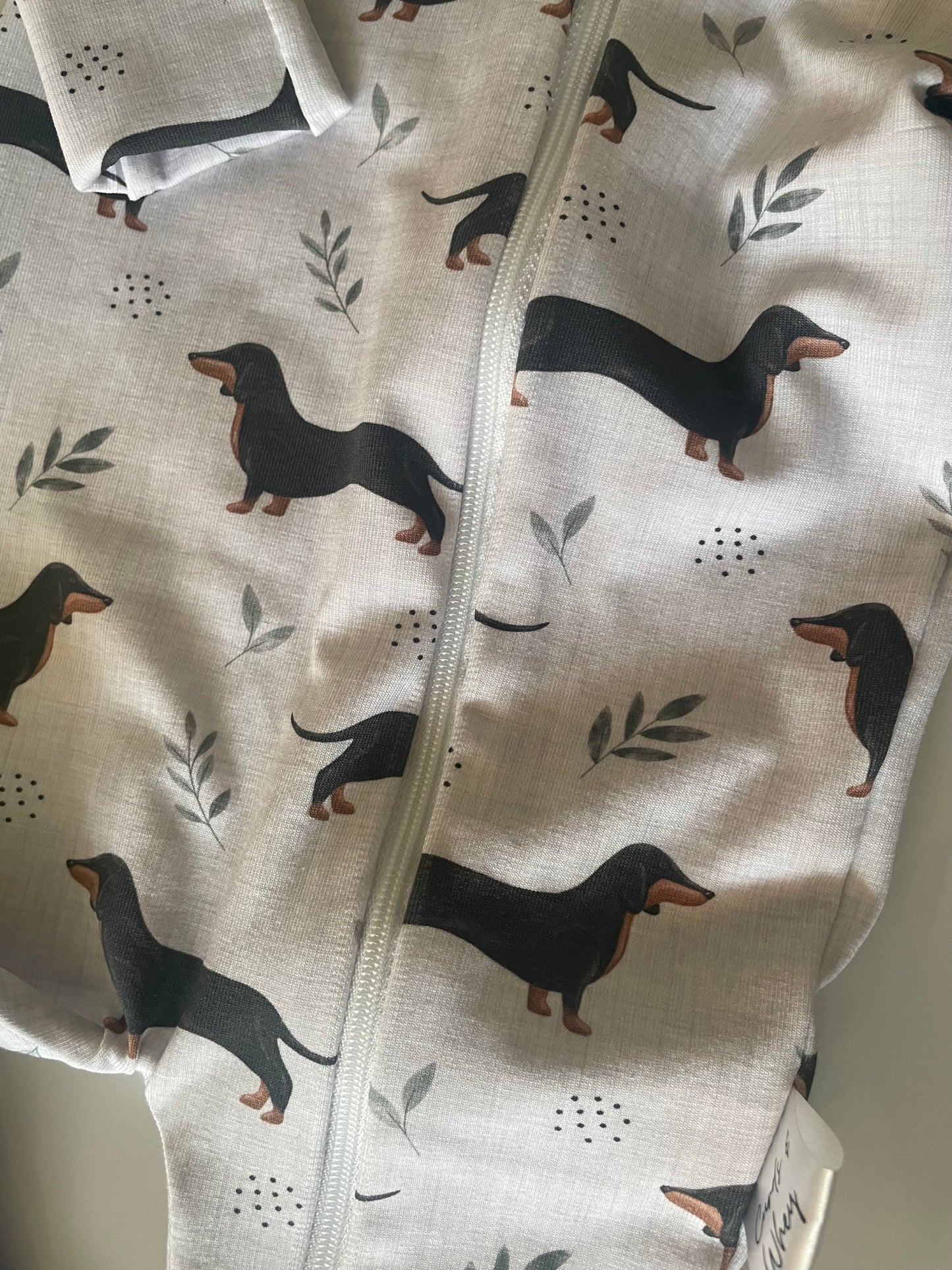 Frankie sausage dog zippy baby-grow