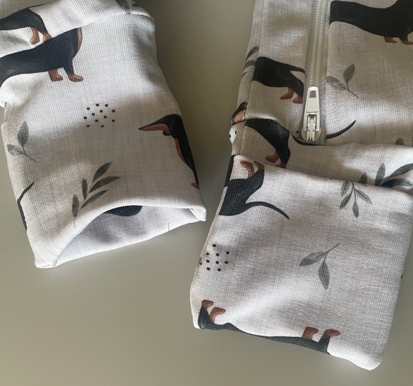 Frankie sausage dog zippy baby-grow