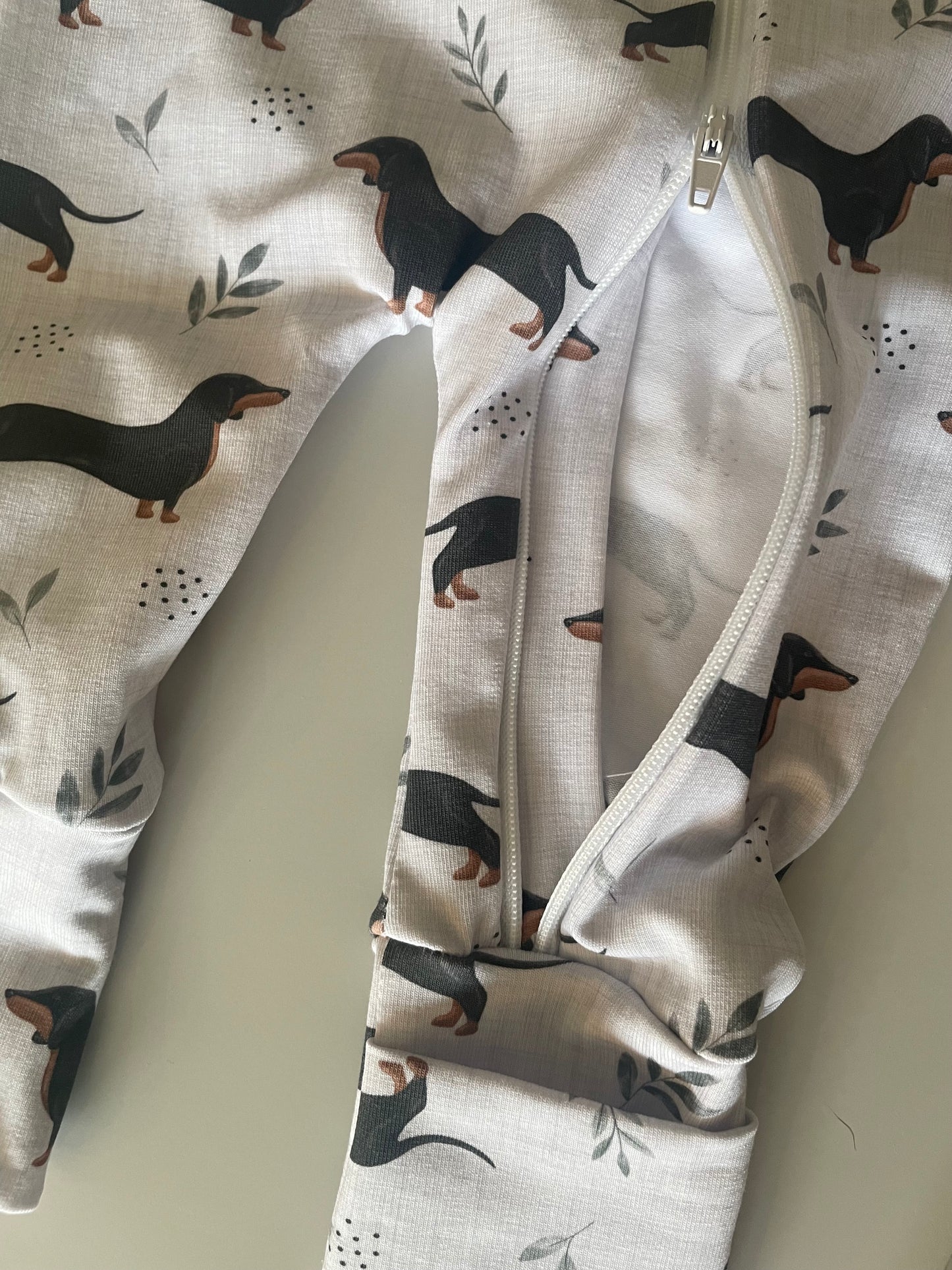 Frankie sausage dog zippy baby-grow
