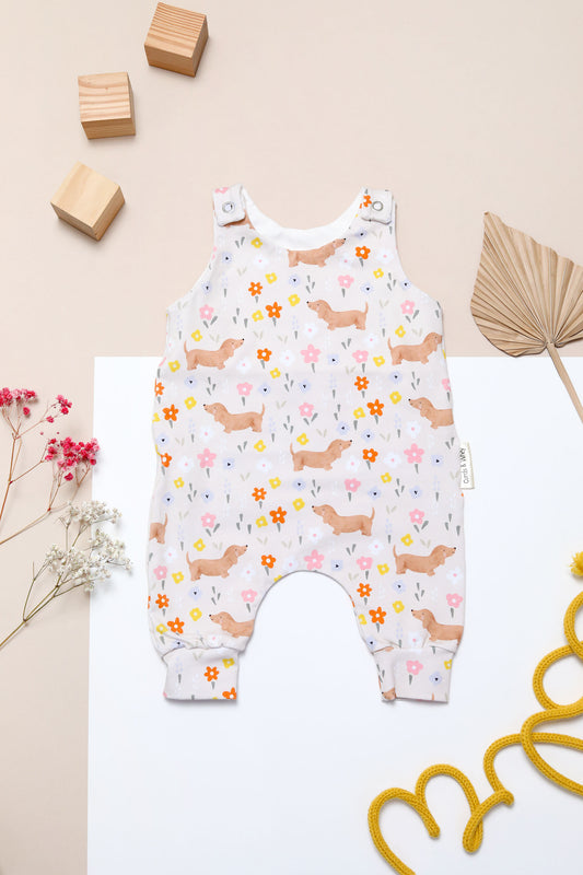 Flora sausage dog baby romper