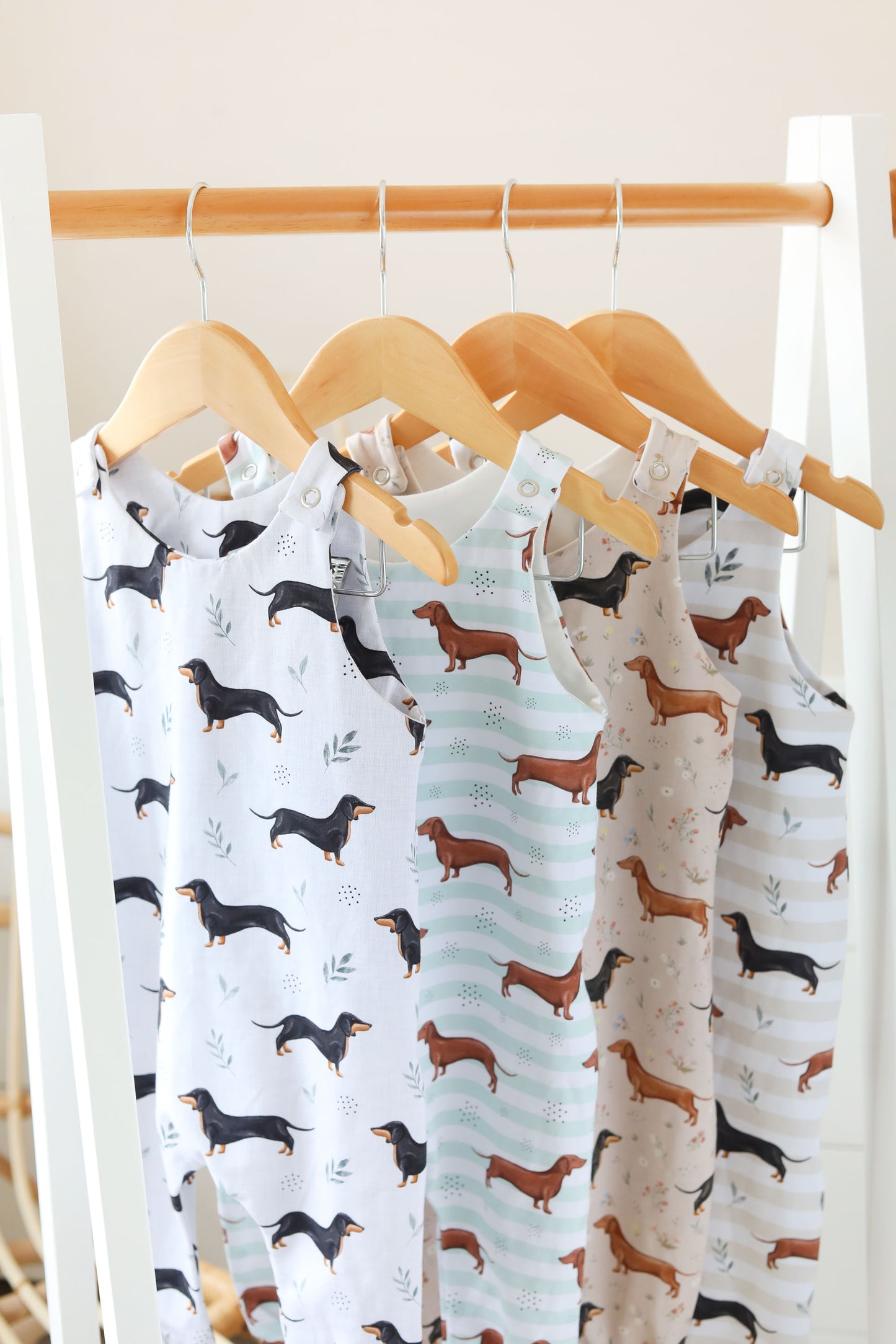Neutral sausage dog striped Romper