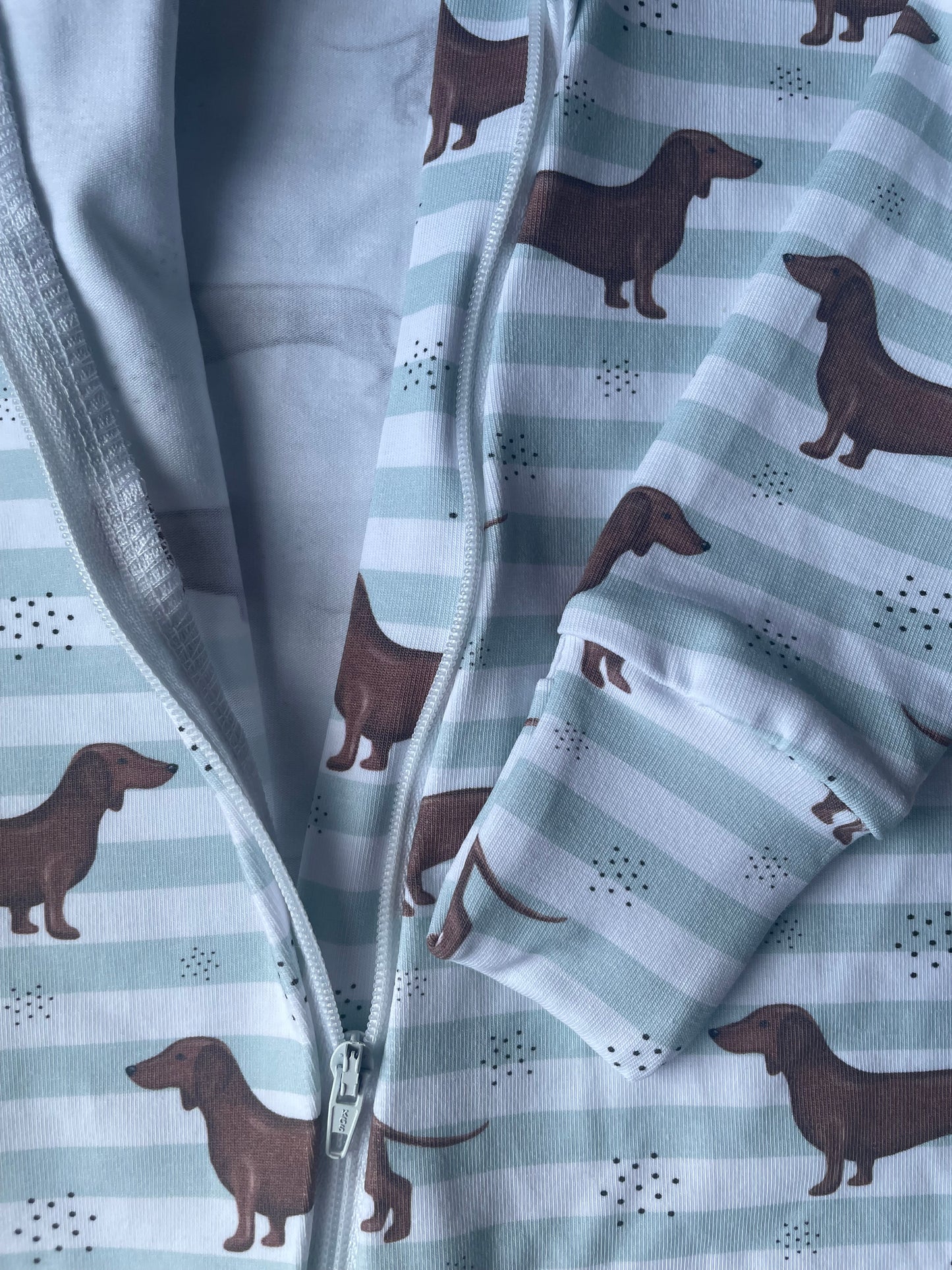 sausage dog mint stripe zippy sleepsuit