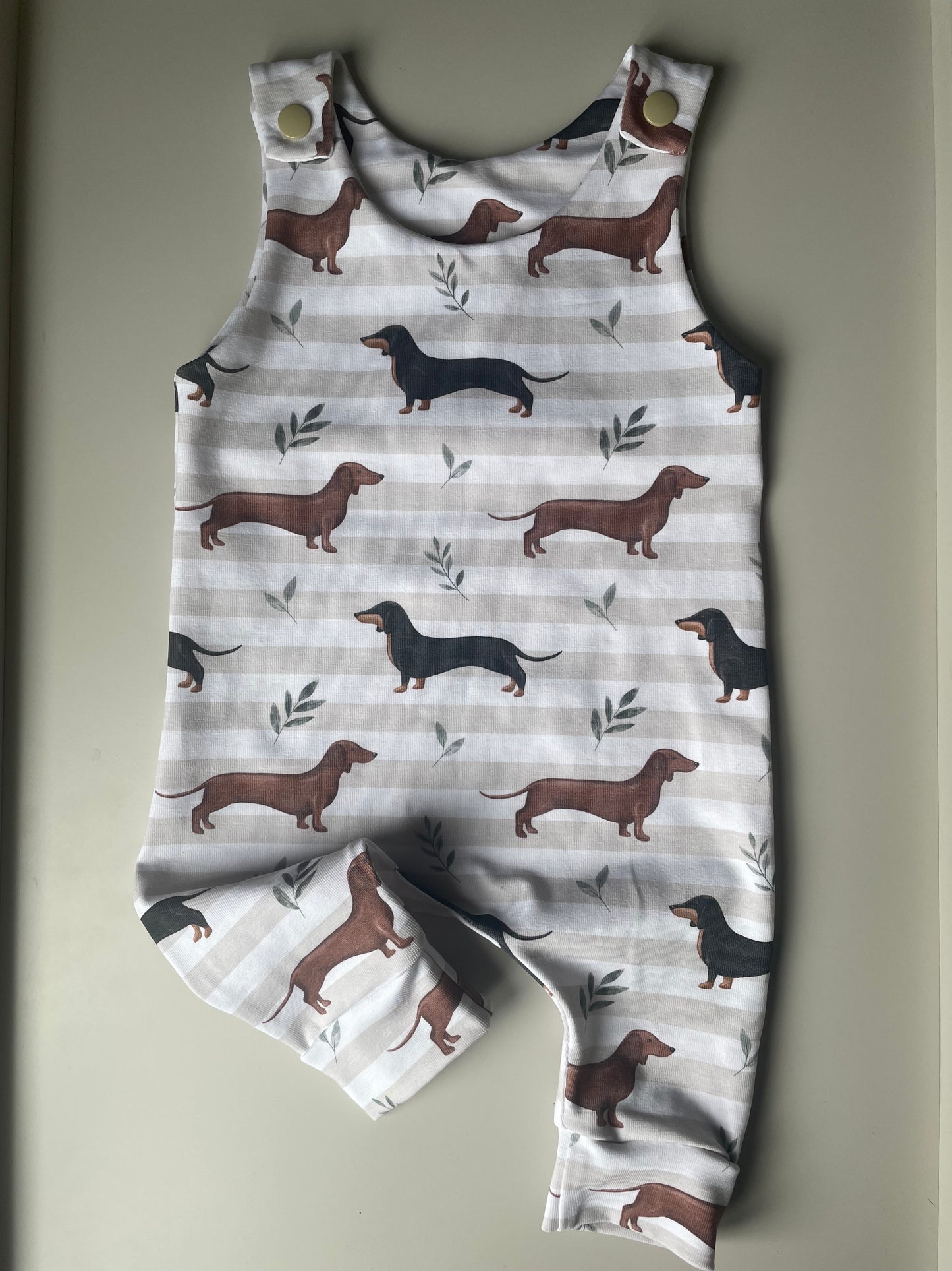 Neutral sausage dog striped Romper