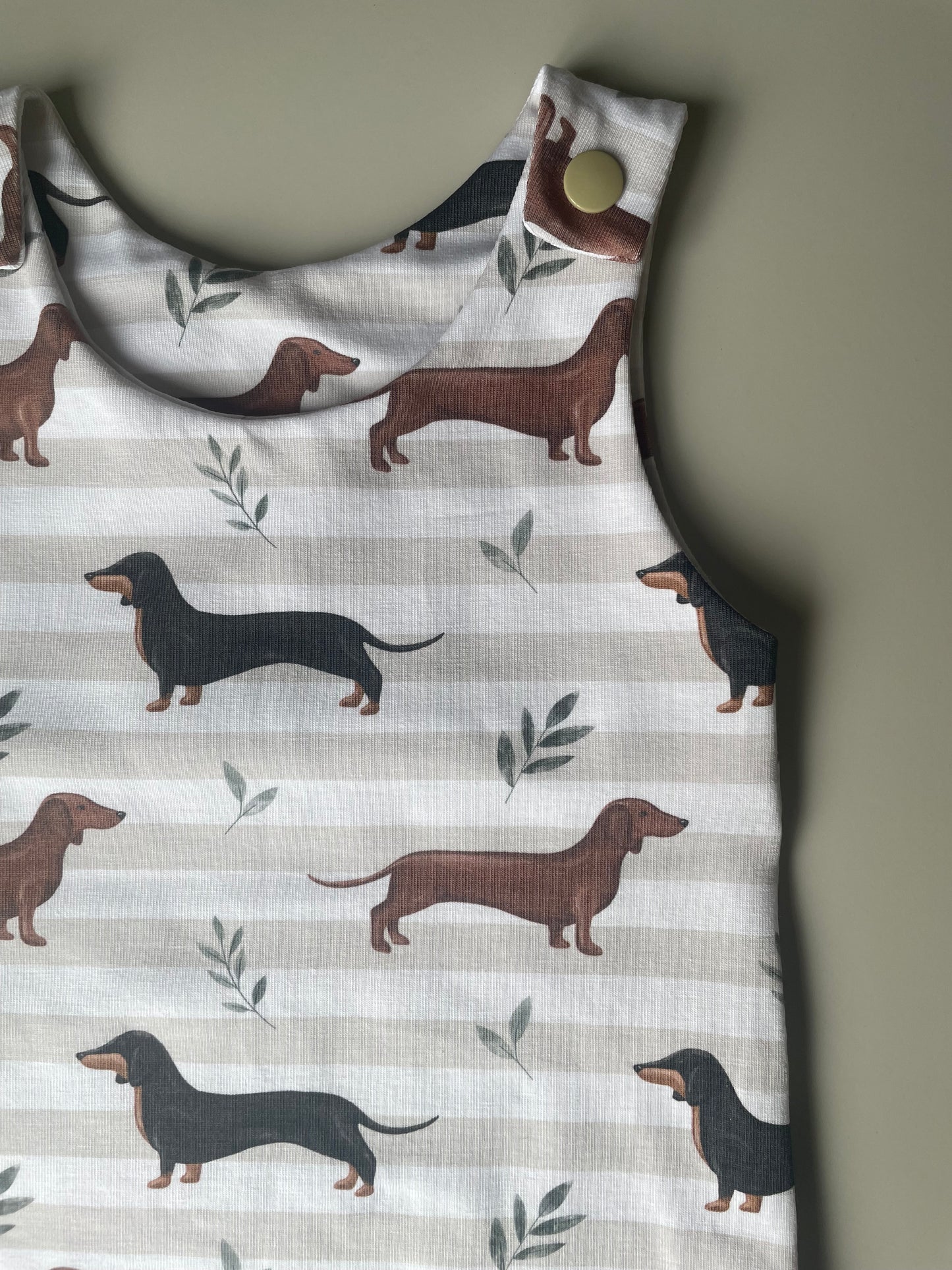 Neutral sausage dog striped Romper