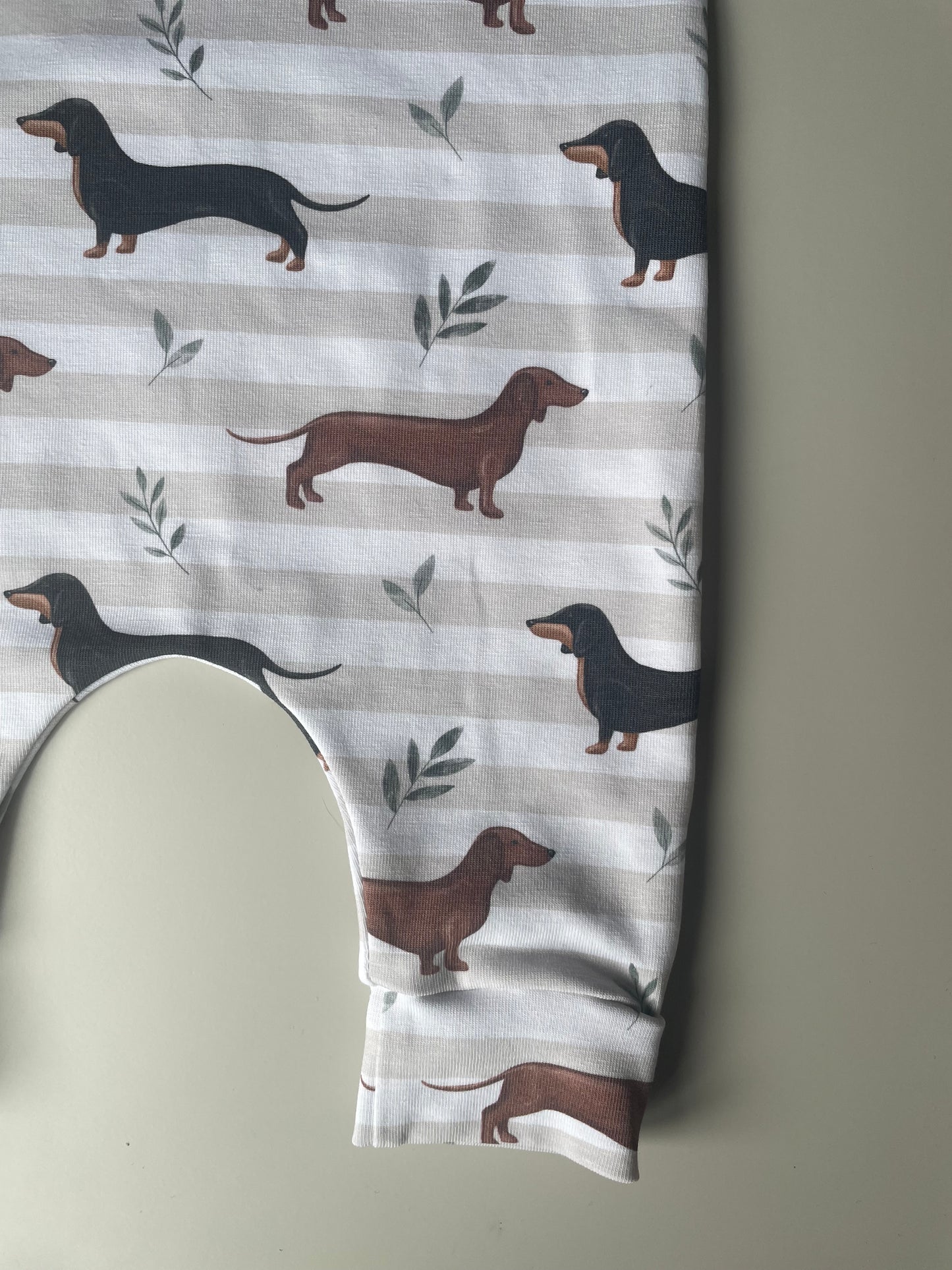 Neutral sausage dog striped Romper