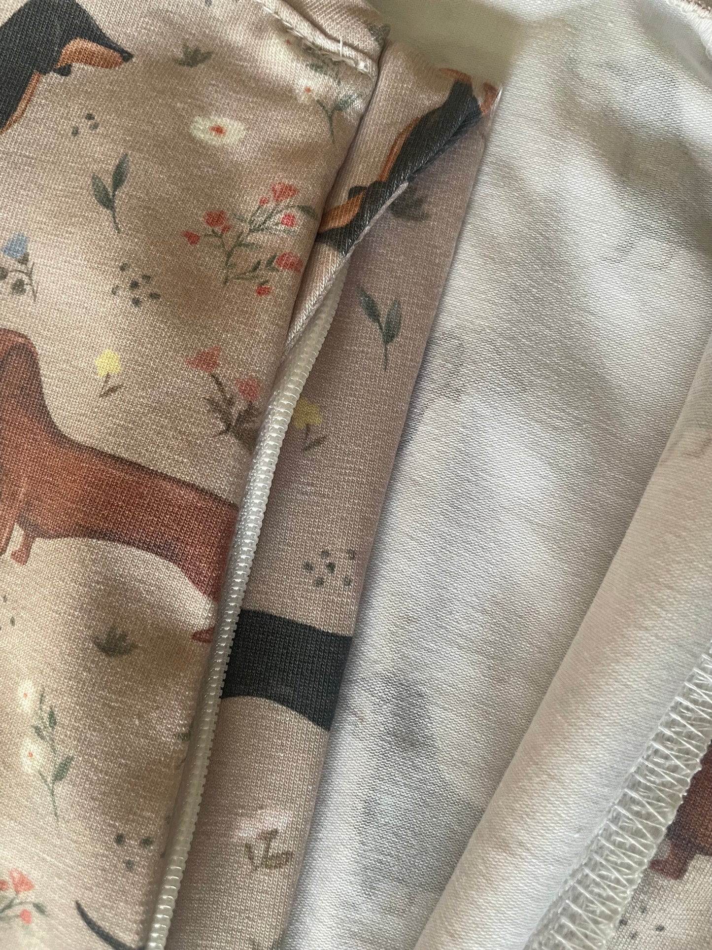 Florence sausage dog zippy sleepsuit