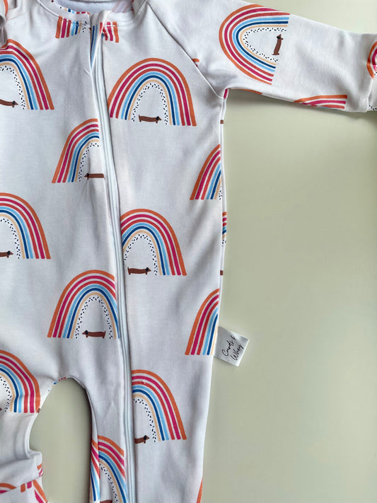 Sausage dog and rainbows  zippy sleepsuit